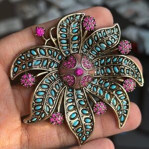 Elegant Floral Brooch with Turquoise and Pink Accents